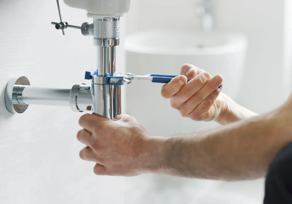 professional-plumber-fixing-a-bathroom-sink-2026-03-23-23-27-24-utc
